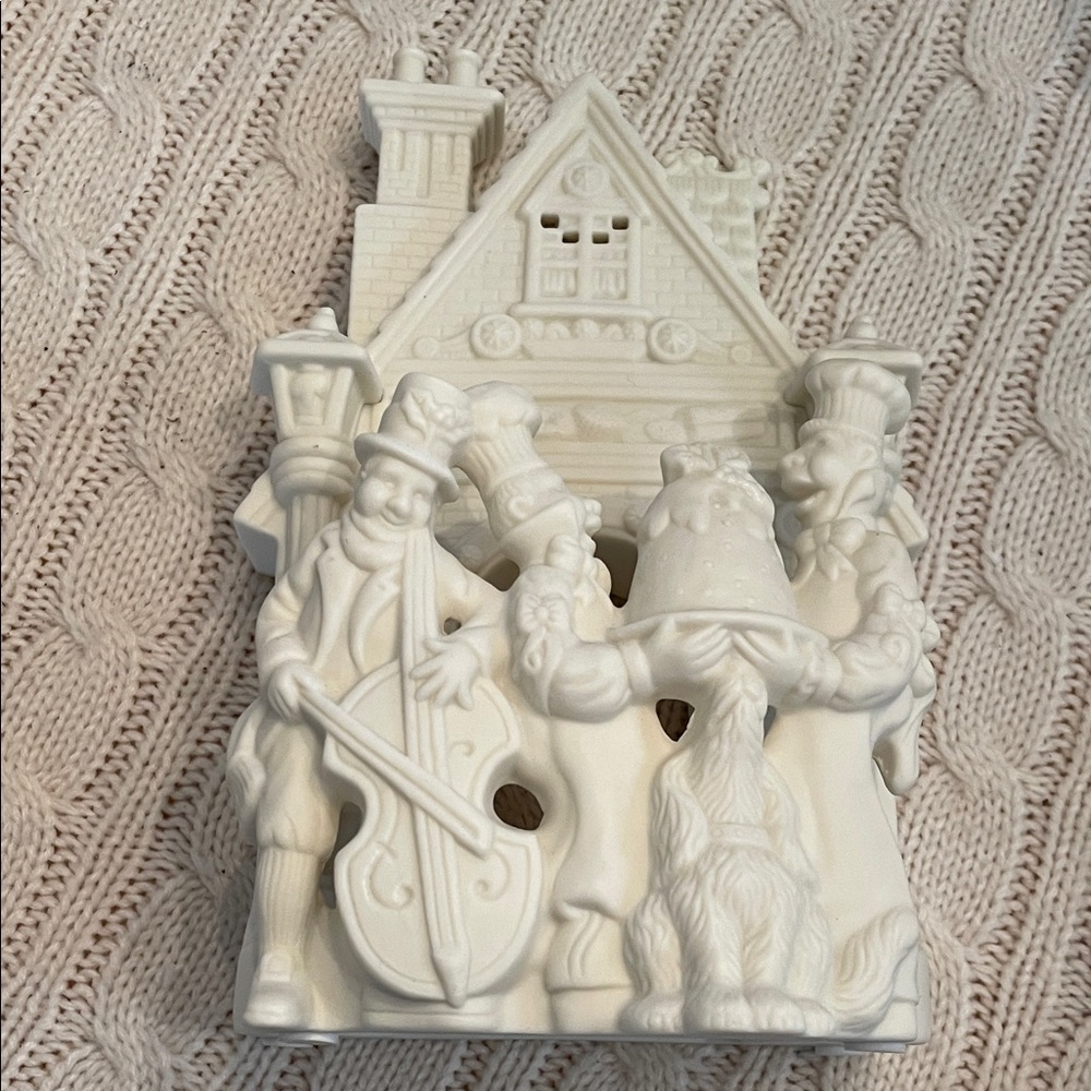 Retired PartyLite Bakery Carolers tealight candle holder
unglazed porcelain